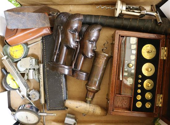 A cased set of weights and a 19th century corkscrew, etc